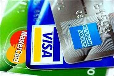 Now, using credit and debit cards will COST you LESS