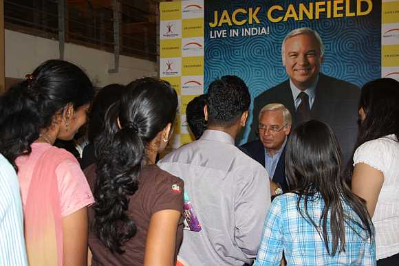 Jack Canfield signing books at the event