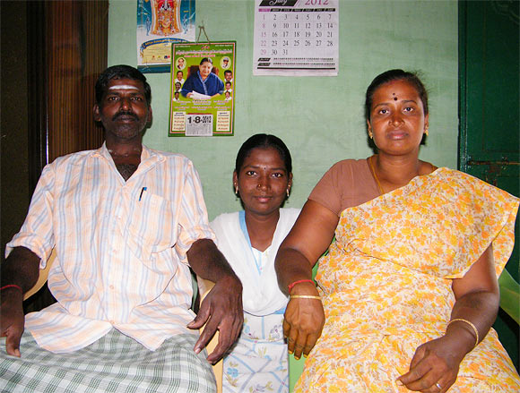 Menaka Murugan with her parents