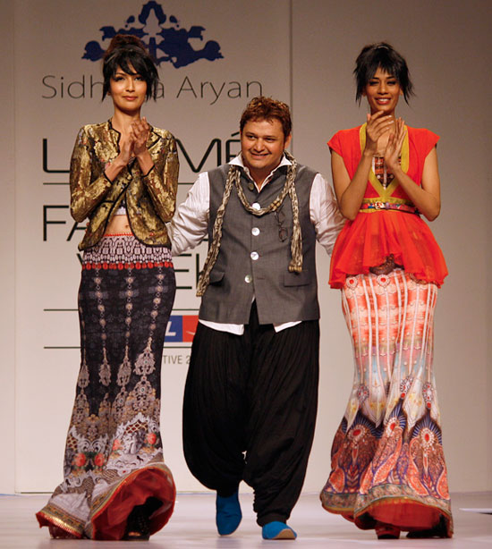 Sidharta Aryan with two of his designs