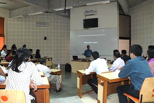 Students attend a digital presentation in class
