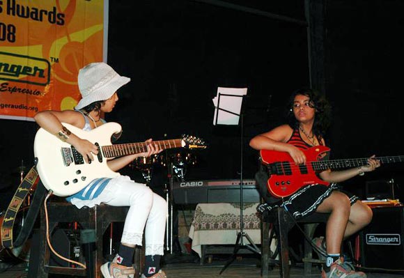 Esani Dey (left), now 13, performs with elder sister Mohini Dey (right)