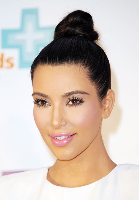 Kim Kardashian is often seen sporting a neat coiled bun