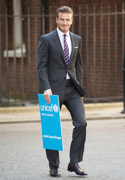 The ever-so-stylish David Beckham arrives to meet British Prime Minister David Cameron, in Downing Street