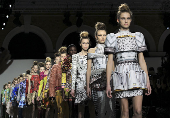 Models walk the ramp for Mary Katrantzou during London Fashion Week