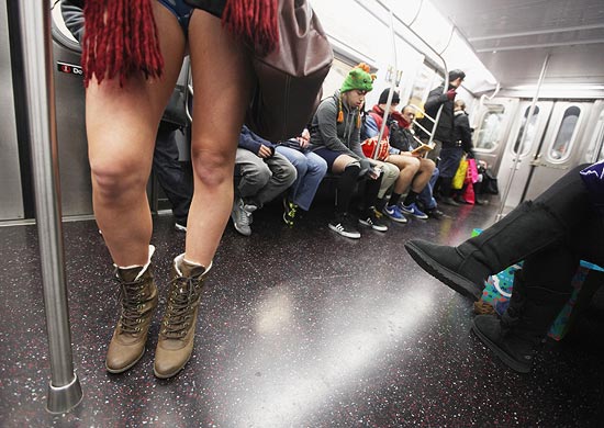 A participant rides the subway during the annual No Pants Subway Ride on January 8, 2012 in New York City