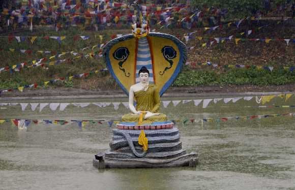 An idol of Lord Buddha is seen at the Mahabodhi temple compound in Bodh Gaya. Photograph: Desmond Boylan/Reuters
