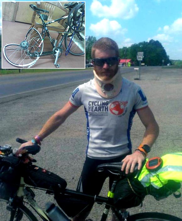 Sean Conway was back on the road four days after the accident; (inset) his bike after he was thrown by a truck
