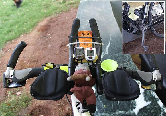 Sean Conway's assembled bike has a GPS map navigator and a GPS transmitter, while its pedals (inset) are engineered to fit his shoes