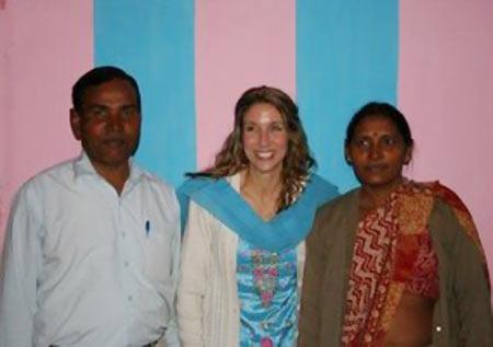 Manoj's  occupational therapist (centre) flanked by his parents