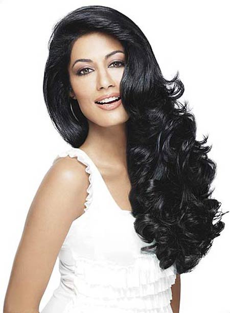 Tame your locks with smoothing products for this glamorous effect, seen on Chitrangada Singh