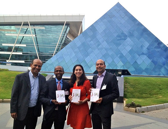 The authors with Vijay Anand, MD Intuit India, at the Infosys Bangalore campus
