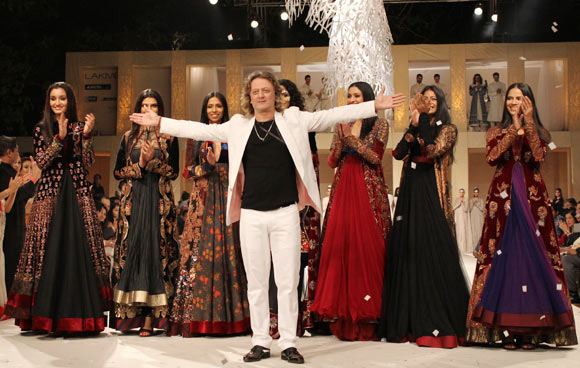 Rohit Bal takes to the ramp as his muses cheer for him