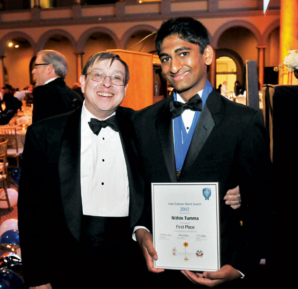 Nikhil Tumma (right) with Intel Science Talent Search judge Andy Yeager