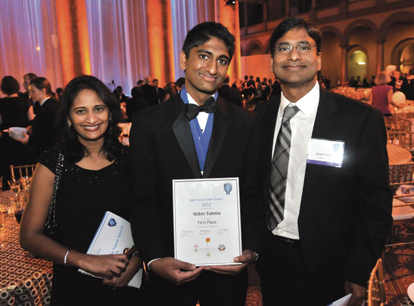 Nithin Tumma (centre) with his parents Dr Kavita (left) and Dr Suresh (right)