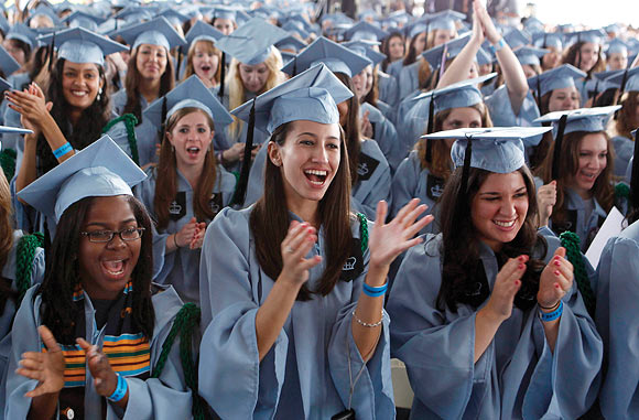 Graduates at Barnard College applaud Barack Obama, May 14