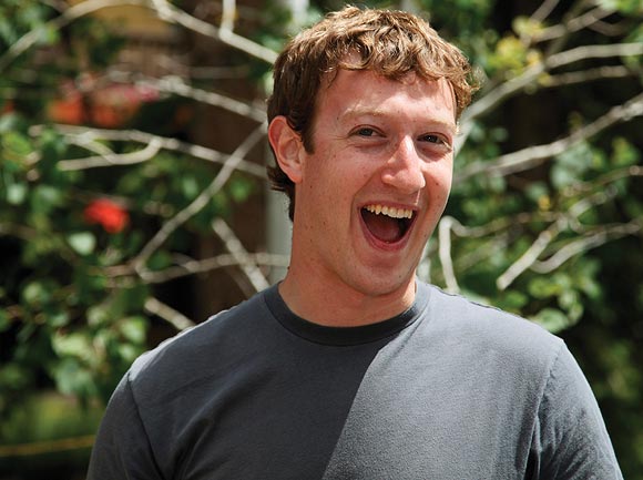Mark Zuckerberg, Facebook CEO and founder laughs outside the Sun Valley Inn in Sun Valley, Idaho July 9, 2009. The resort is the site for the annual Allen & Co's media and technology conference.