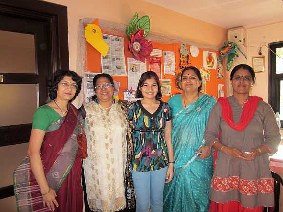 Shalaka (centre) with her mother Aparna Kulkarni (extreme left) and teachers
