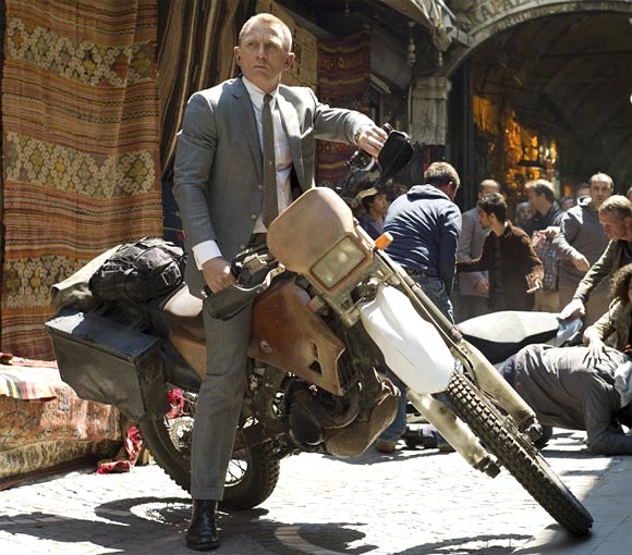 Daniel Craig as James Bond in Skyfall in an action scene atop Honda CRF250R