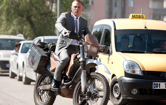 Daniel Craig as James Bond in an action sequence in Skyfall atop Honda CRF250R