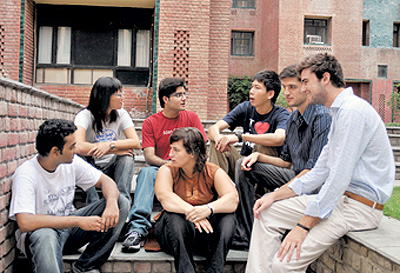 Students from IMT Ghaziabad catch up after finishing their classes.