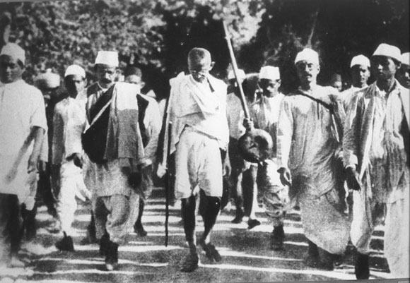 Gandhi walks to Dandi to protest against tax on salt, an act of defiance that shook the Empire