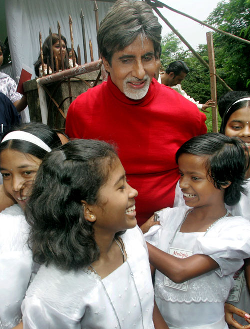 The Bollywood star interacts with orphans from the tsunami-affected Andaman and Nicobar islands in Mumbai