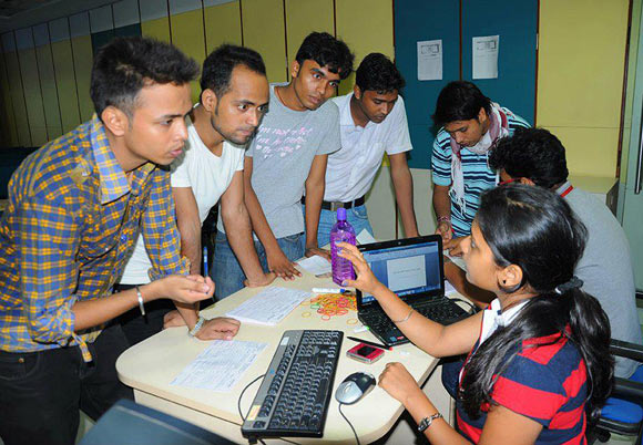 Students register for a summer induction programme.