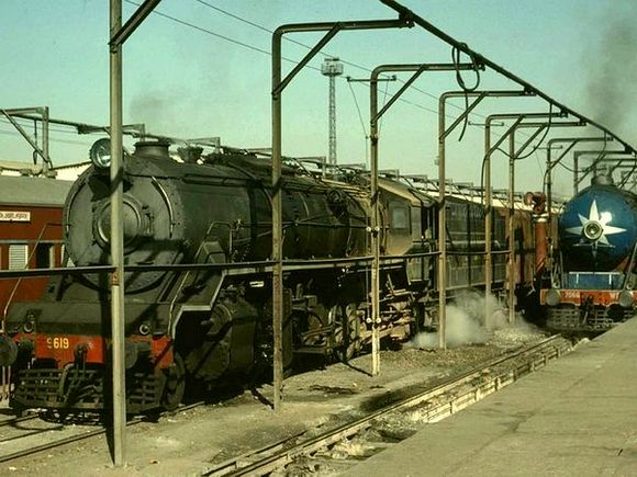 The last of the steam locomotives made way for diesel and electric ones by the 1980s. Seen here is a WG class 2-8-2 N  9616 on the left and class 4-6-2 N  7066 on the right.