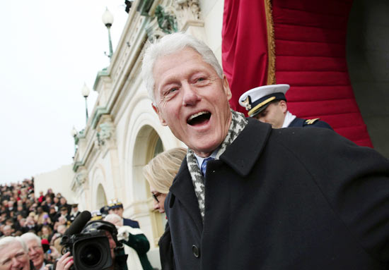 Former U.S. President Bill Clinton arrives for the presidential inauguration on the West Front of the U.S. Capitol in Washington January 21, 2013.