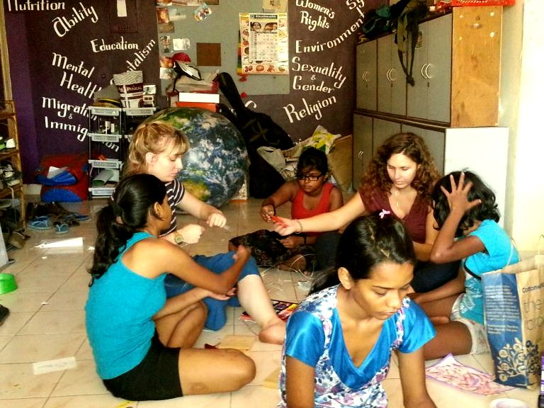 The flat from which Kranti operates. Seen here are German volunteers teaching the girls to sketch, paint and sculpt.