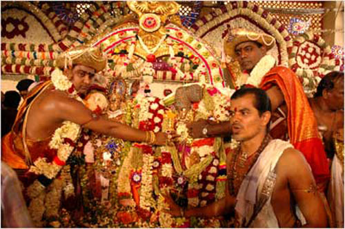 Pandits perform the celestial marriage in Madurai's Meenakshi Amman temple