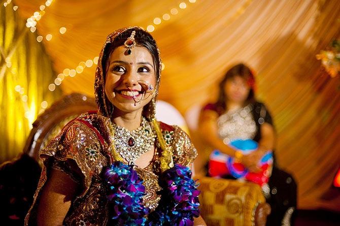 A beautiful bride is all smiles on her special day.