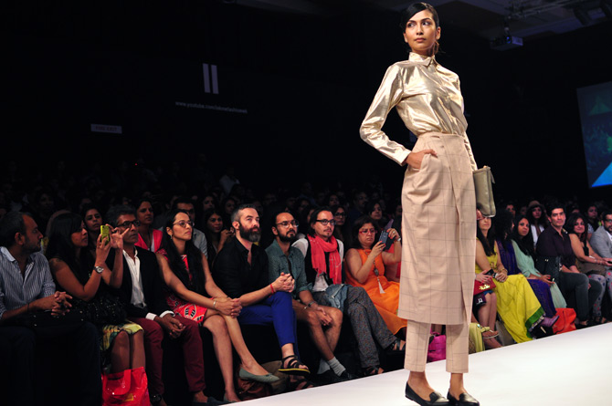 A biege creation in satin by Nimish Shah