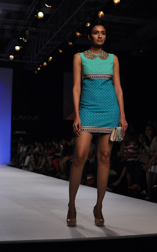 A model walks in a cobalt blue number by Ranna Gill