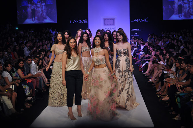 Designer Shehlaa Khan takes a bow with showstopper Jacqueline Fernandez .