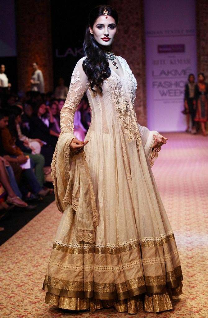 Buy Beige and gold embroidered lehenga set by Ritu Kumar at Aashni and Co