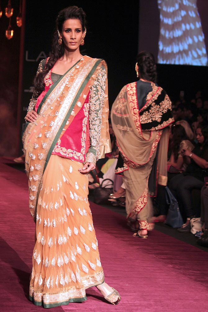 Model Kavita Kharayat showcases a Shyamal and Bhumika creation.