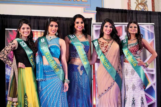 Winner Monica Gill, center, and first runner-up Angela Nand, right, with others who figured among the top five at the Miss India USA pageant held at the Royal Alberts Palace in New Jersey, November 24.