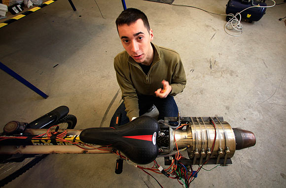 Raul Oaida prepares his bicycle propelled with a self-built jet engine for a road test in Deva, 399 km (245 miles) of Bucharest.