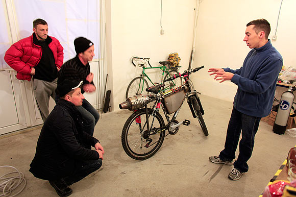 Raul Oaida prepares his bicycle propelled with a self-built jet engine for a road test in Deva, 399 km (245 miles) of Bucharest.