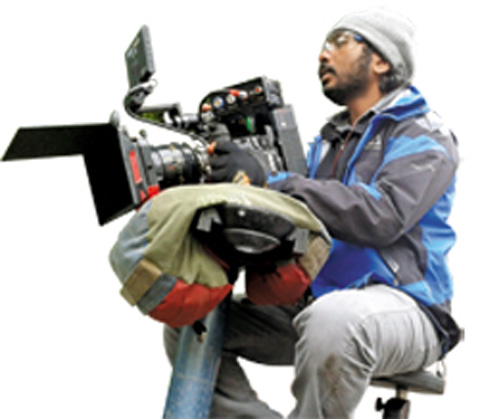 Sanu Varughese instructs his crew during an outdoor shoot