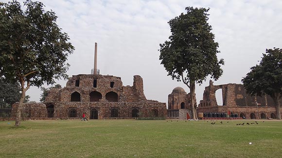 The magnificent ruins of the Jami Masjid and Ashok Pillar