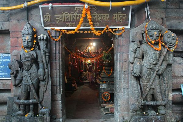 Entrance to Jageshwar Jyotirling. Dwarpals or door-keepers have a different looks from what I have seen in other temples.