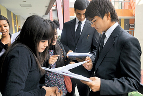 aw students at the Jindal Law School, Sonipat, discuss course material and cases in the corridors, after class