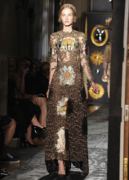 A model walks the runway during the Valentino show as part of Paris Fashion Week Haute-Couture Fall/Winter 2013-2014 at Hotel Salomon de Rothschild on July 3, 2013 in Paris, France