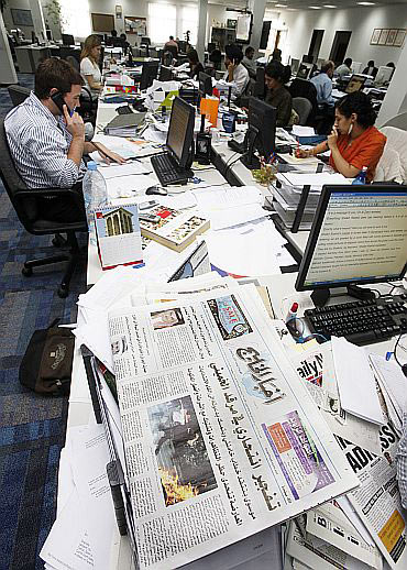 Journalists work at the Gulf Daily News in Manama