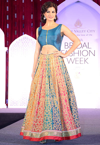 Jacqueline Fernandez walks the ramp for Jyotsna Tiwari at the Aamby Valley India Bridal Fashion Week Preview in Delhi on July 10, 2013