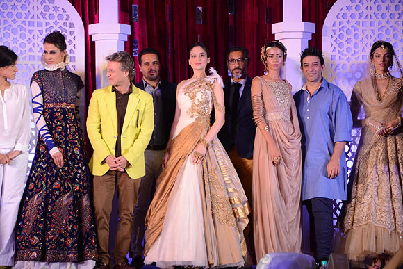 (L-R) Designers Rina Dhaka, Rohit Bal, Shantanu & Nikhil and Suneet Varma with their creations at the Aamby Valley India Bridal Fashion Week Preview in Delhi on July 10, 2013