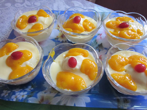 Mango and Cottage Cheese Snowballs in Custard